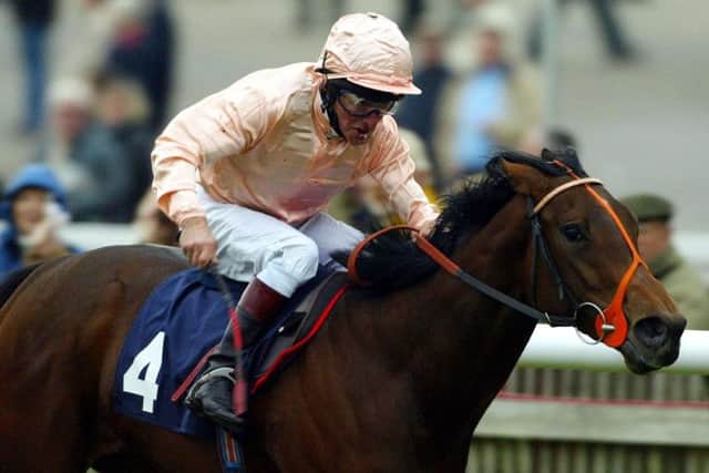 Dowager, ridden by Pat Eddery on his way to win The E.B.F Bosra Sham Fillies Stakes at the Rowley Mile racecourse at Newmarket in 2003