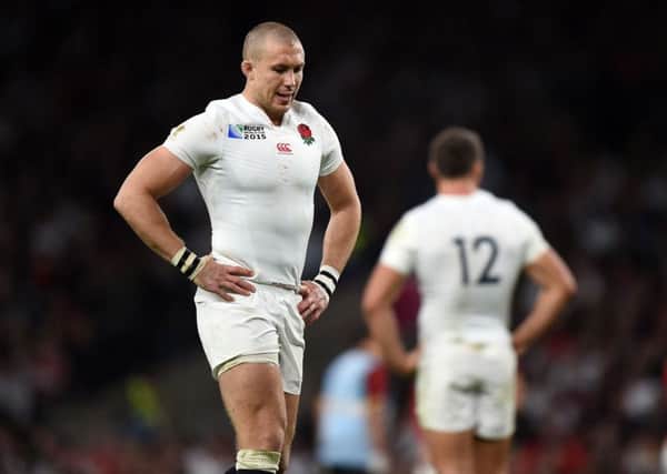England's Mike Brown (left) during a Rugby World Cup match at Twickenham Stadium, London.