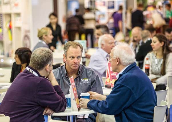 Nisa chief executive Nick Read talks to member at its annual exhibition. (Picture: Bristo Photography)