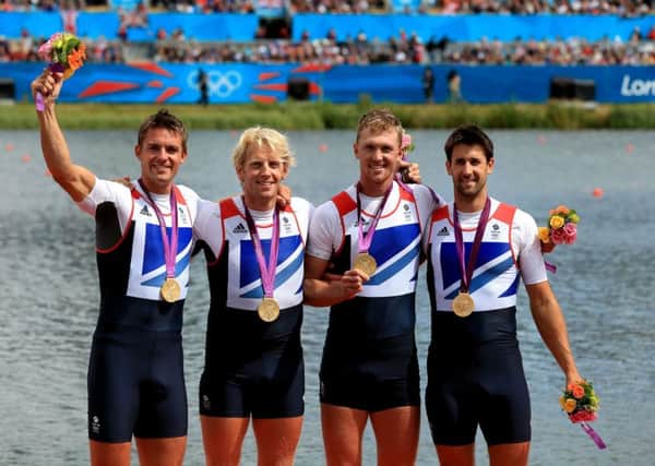 Yorkshire rower Andrew Triggs Hodge (second from left) celebrates his gold medal as part of Great Britain's Men's Four at the London Olympics. Photo: Stephen Pond/PA.