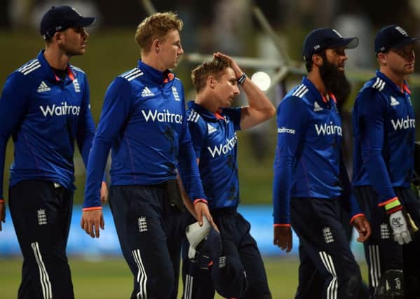 England captain Eoin Morgan, left and players Joe Root, James Taylor, Moeen Ali and Jos Buttler show their disappointment after defeat in the first one day international match against Pakistan at Zayed Cricket Stadium. AP/Hafsal Ahmed.