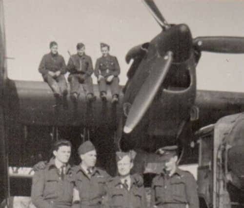 Sgt. Bill Gracie, (Kneeling right), with his fellow crew, including pilot, PO. Gerry Philbin (standing second from left) in front of their Halifax LK991 of 431 Sqn. at Tholthorpe.