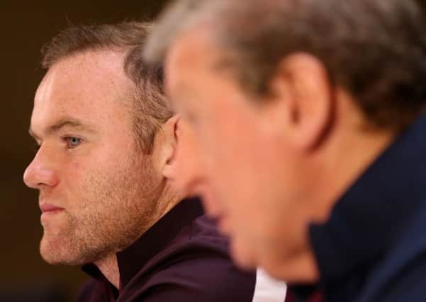 Wayne Rooney and Manager Roy Hodgson during a press conference at the Asia Gardens Hotel, Alicante.