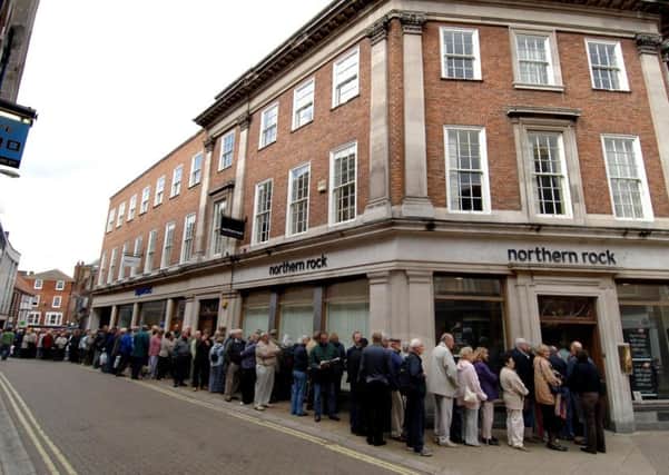 Customers queuing to withdraw money from a Northern Rock Bank in York in 2007. Photo: John Giles/PA Wire