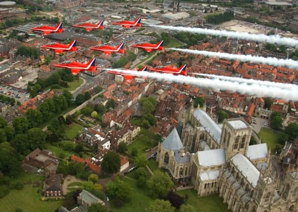 2004: The RAF Red Arrows fly over York Minster en route to RAF Linton on Ouse. Picture:  Bruce Rollinson