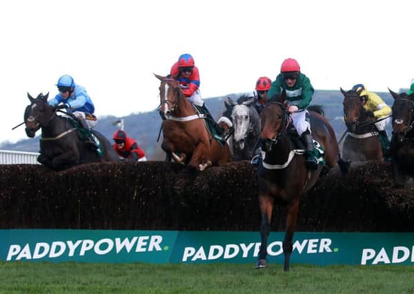 Eventual winner Keel Haul ridden by James Davies (extreme left) jumps the last in the Paddy Power Handicap Chase.