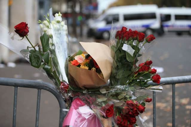 Flowers and tributes by the Bataclan, Paris, one of the venues for the attacks in the French capital. PIC: PA