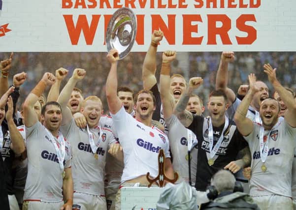 England's Sean O'Loughlin lifts the Baskerville Shield after winning the series following International Test Series match at the DW Stadium, Wigan. (Picture: Richard Sellers/PA Wire)