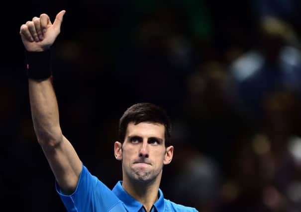 Serbia's Novak Djokovic celebrates his win during day one of the ATP World Tour Finals at the O2 Arena, London