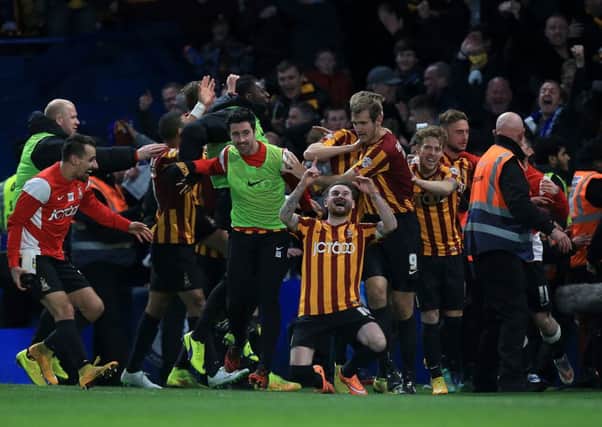 Bradford Citys Mark Yeates celebrates after scoring his sides fourth goal against Chelsea in the FA Cup