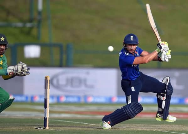 HITTING OUT:  James Taylor on his way to making 60 for England during the first one-day international against Pakistan at Zayed Cricket Stadium in Abu Dhabi last week. The two sides go into the third ODI of the series level at 1-1. Picture: Hafsal Ahmed/AP.