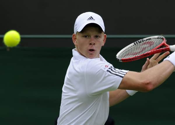 Britain's Kyle Edmund in action against Poland's Jerzy Janowicz at Wimbledon in 2013. (Picture: Rebecca Naden)
