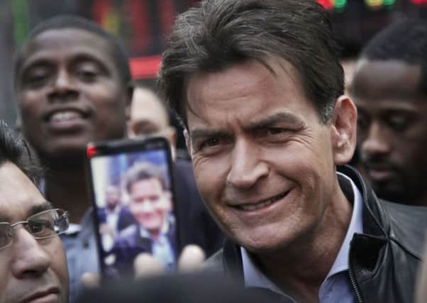 Actor Charlie Sheen has admitted he is HIV-positive