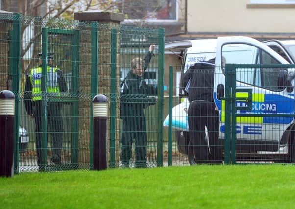 Police at the scene of the discovery. Picture: Tony Johnson
