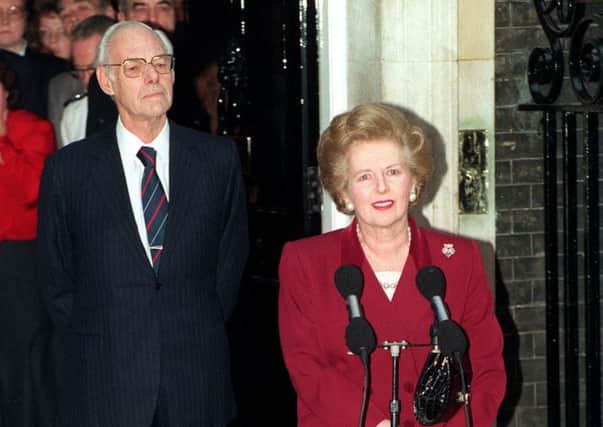 Minister Margaret Thatcher, watched by husband Denis, making her final speech outside 10 Downing Street in November 1990, before leaving for Buckingham Palace to offer her resignation to the Queen.