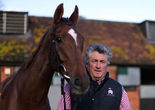 Trainer Paul Nicholls with Silviniaco Conti at Manor Farm Stables, Ditcheat, Somerset.