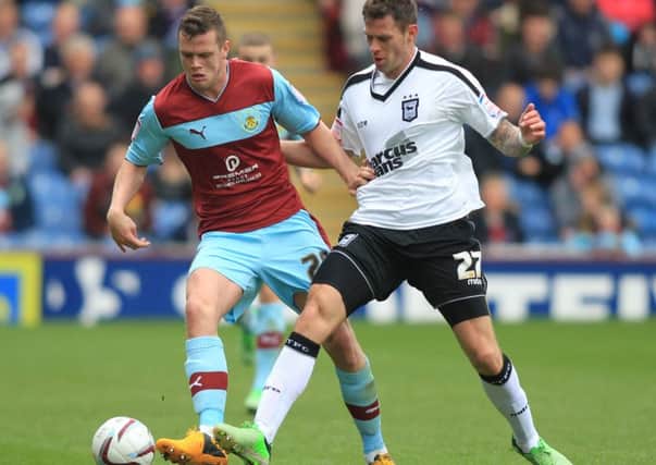 Defender Kevin Long has joined Barnsley on loan from Burnley.
