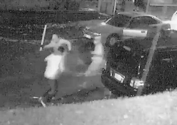 CCTV that shows Nissar Hussain being beaten up outside his house in Bradford. Pictures: Ross Parry Agency