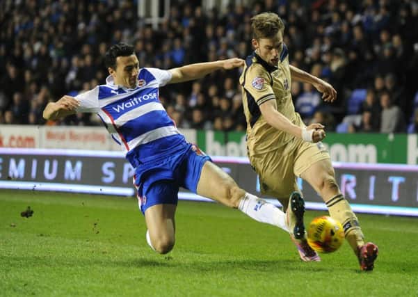 Stephen Kelly slides in on Charlie Taylor while playing for Reading against Leeds United in February this year.  Picture: Bruce Rollinson.
