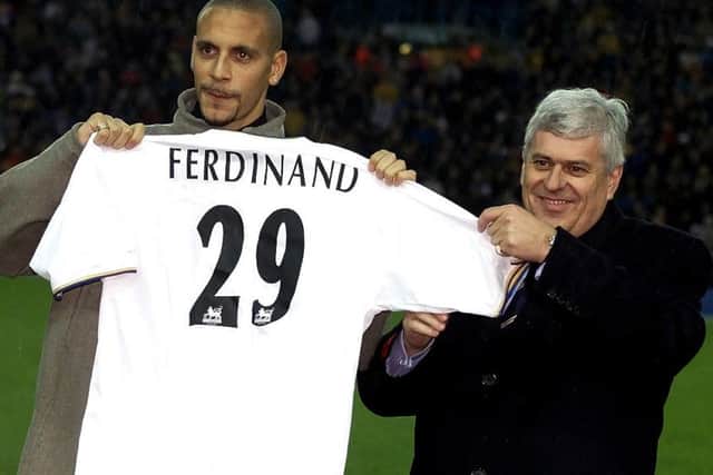 GOT HIM: £18 million signing Rio Ferdinand (left) is introduced to Leeds United supporters at Elland Road  by chairman Peter Ridsdale in November 2000. Picture : Phil Noble.