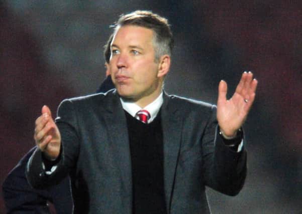 Date:31st October 2015. Picture James Hardisty.
Doncaster Rovers v Colchester United. Pictured Doncaster Rovers Manager Darren Ferguson, applause to the home crowds after his frist home win.