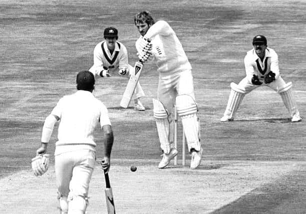 England's Ian Botham as he plays a defensive stroke against a delivery from Australian Terry Alderman (not pictured), during the fourth day of the third Cornhill cricket Test Match at Headingley, 1981 Leeds. PA Photo.