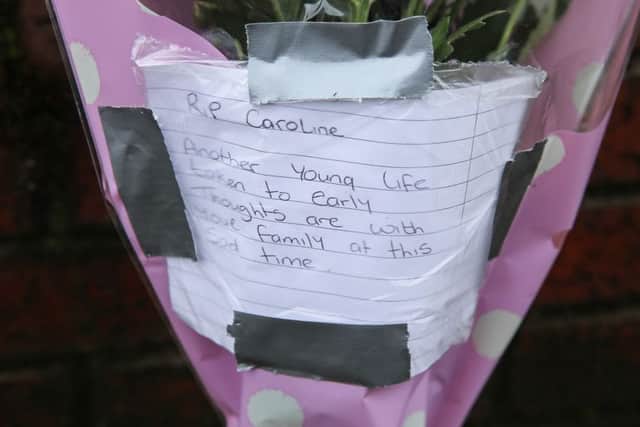 Flowers left at a police cordon around a river at Ecclesall Road, Sheffield. Picture: Ross Parry Agency
