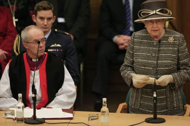 Queen Elizabeth II alongside the Archbishop of Canterbury the Most Reverend Justin Welby addresses the Tenth General Synod.