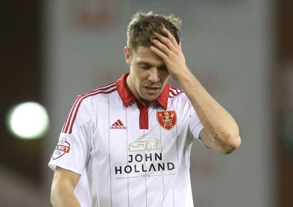 Dean Hammond of Sheffield United looks dejected after their defeat to Shrewsbury. (Picture: Philip Oldham/SportImage
)