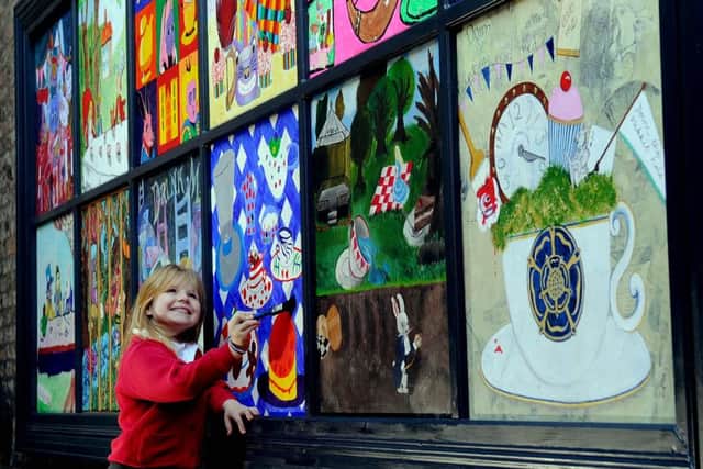 DAB HAND: Ruby Beadle, six, a pupil from Holy Trinity CE Infant School, putting the finishing touches to their picture. PIC: James Hardisty