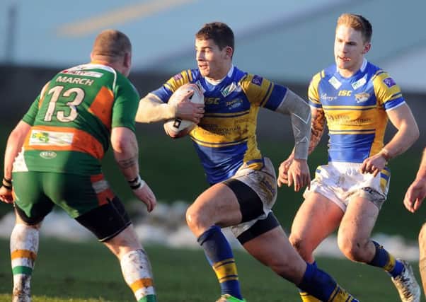 Action from the 2013 Lazenby Cup between Hunslet Hawks and Leeds Rhinos, with Stevie Ward on the charge
. Picture: Gerard Binks.
