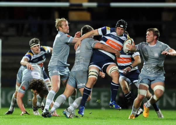 Ryan Burrows finds the odds stacked firmly against him as he tries to forge ahead for Yorkshire Carnegie against London Welsh last night (Picture: Steve Riding).
