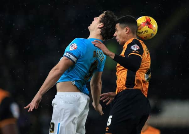 Hull City's Curtis Davies goes up against Derby County's Chris Martin at the KC Stadium on Friday (Picture: Mike Egerton/PA Wire).