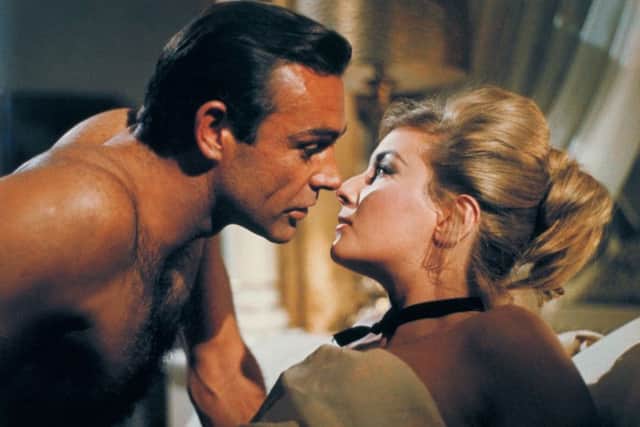 Sean Connery, left, as James Bond in a scene from the 1963 film, "From Russia With Love."