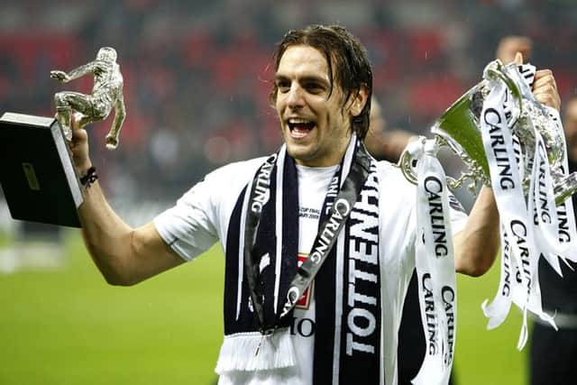 Tottenham Hotspur's Jonathan Woodgate celebrates after winning the Carling cup  at Wembley Stadium, London. PRESS ASSOCIATION Photo. Picture date: Sunday February 24, 2008.