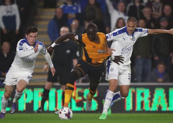 Hull City's Mohamed Diame battles for the ball with Leicester City's Gokhan Inler, right, and Benjamin Chilwell during the Capital One Cup, Fourth Round match at the KC Stadium in October. Hull won 5-4 on penalties.
