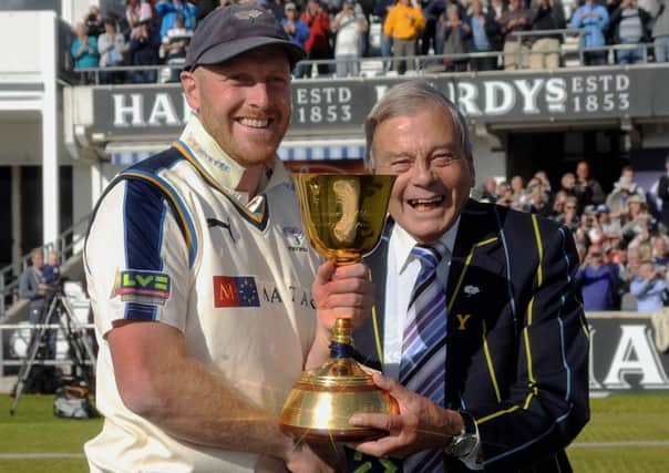 Yorkshire President Dickie Bird presents captain Andrew Gale the 2015 LV County Championship Trophy.