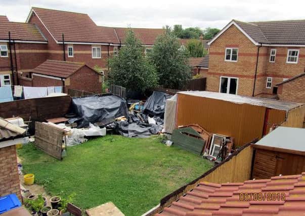 Andrzei Jonski, facing a £3,000 legal bill for having scruffy gardens. Pictured is the neighbours view of  his back garden with DIY shed, plastic sheeting and building materials which are destroying the  residential amenity of his five neighbours from their homes which overlook his house. See story Hull News and Pictures.