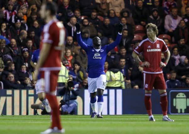 Everton's Romelu Lukaku (centre) celebrates scoring his side's second goal as Middlesbrough players look dejected. Picture: PA.