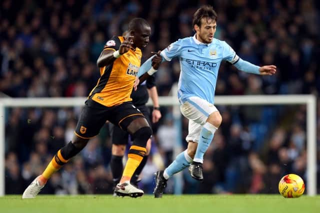 Manchester City's David Silva (right) and Hull City's Mohamed Diame (Picture: Martin Rickett/PA Wire)