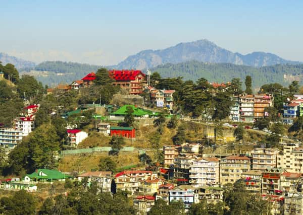 Shimla, where Rudyard Kipling worked as a young news reporter, 
 sprawls over the hillsides, houses clinging to the slopes by their fingernails.