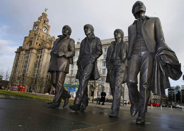 A new statue of the Beatles is unveiled