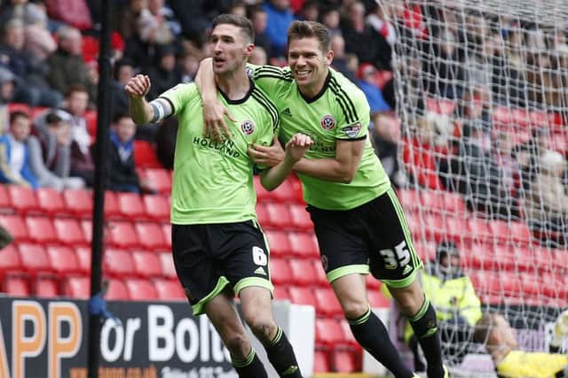 Chris Basham, seen celebrating his strike against Barnsley with Dean Hammond, believes the Oakwell performance was just what Sheffield United required (Picture: Sport Image).