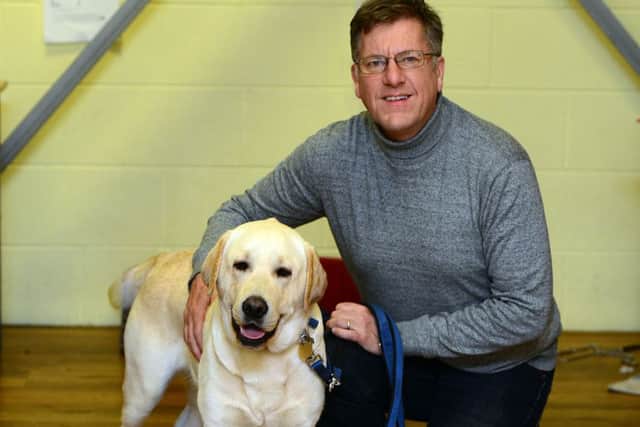 Foster carer Simon Webb with Hutch at Support Dogs in Sheffield. Picture Scott Merrylees