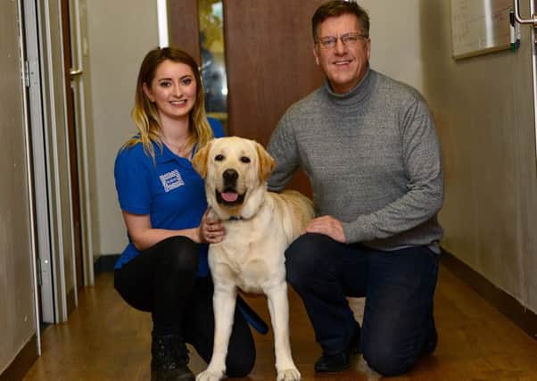 Foster carer Simon Webb with Sophie Millar and Hutch at Support Dogs in Sheffield. Picture Scott Merrylees