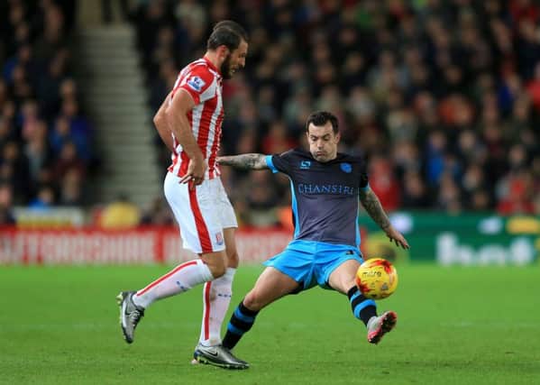 Stoke City's Erik Pieters (left) and Sheffield Wednesday's Ross Wallace