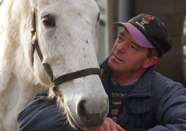 Show-jumper John Whitaker with one of his famous Olympic mounts, Milton (Picture: James Hardisty).