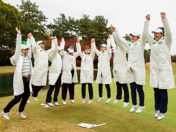Hosts Japan jump for joy after winning The Queens presented by Kowa, a new match play team event.
