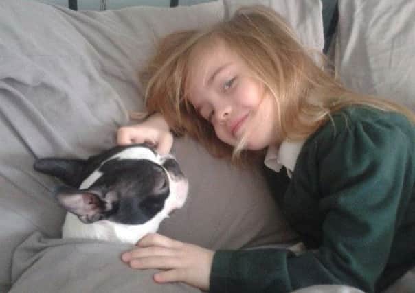 Isla Kerr, 7, has written to Santa Claus asking him to find her lost dog Dolly. Picture: Ross Parry Agency