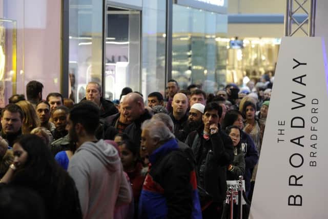 Shoppers queuing for the opening of The Broadway shopping in Bradford in November.
Picture Bruce Rollinson